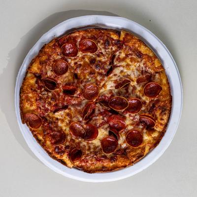 Pepperoni pizza served, top view