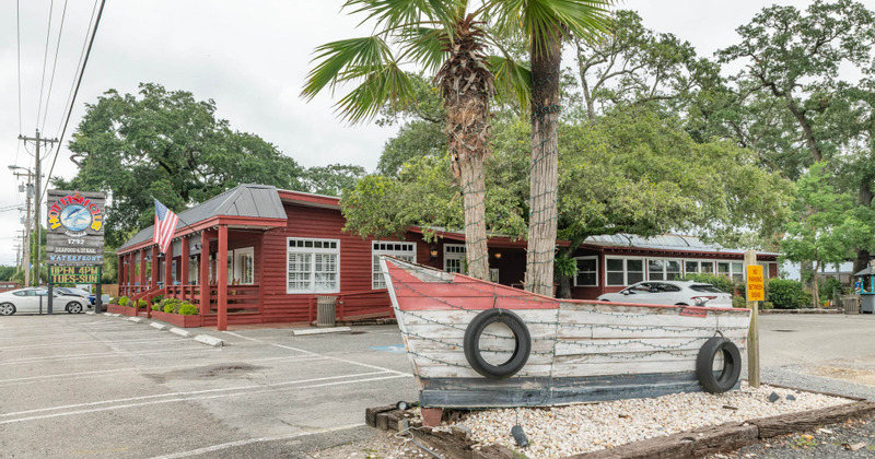 Exterior, parking in front with a boat decoration