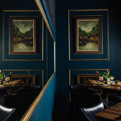 Interior, corner table, framed picture, large wall mirror