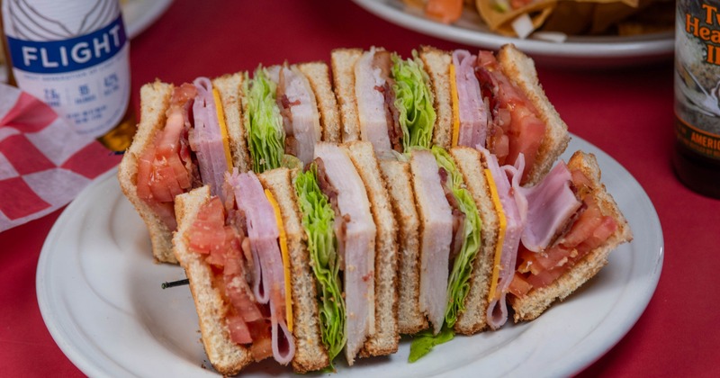 Club sandwich, cut into quarters and held together with toothpicks