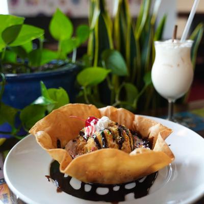 Fried ice cream served in a tortilla bowl img