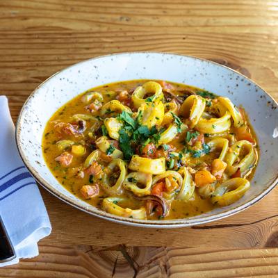 Pan Roasted Calamari in garlic saffron sauce.