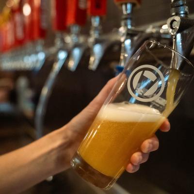 Pouring beer from the tap.