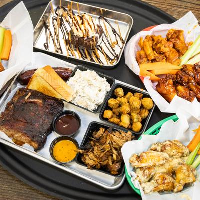 Variety of food items on a serving tray.