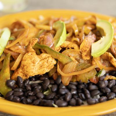 A closeup on fajitas plate.
