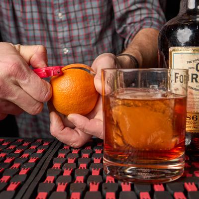 A person preparing a drink.