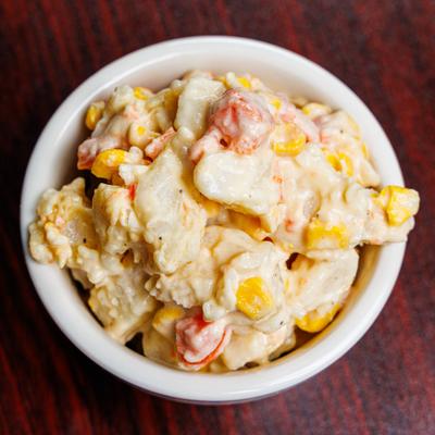 Hatian Potato Salad with corn and pepers.