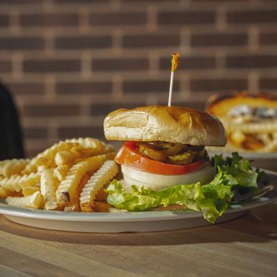 Crispy Chicken sandwich, with tomato, lettuce, cheese and fries