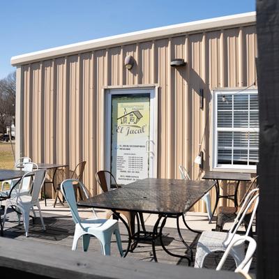 Tables and chairs outside.