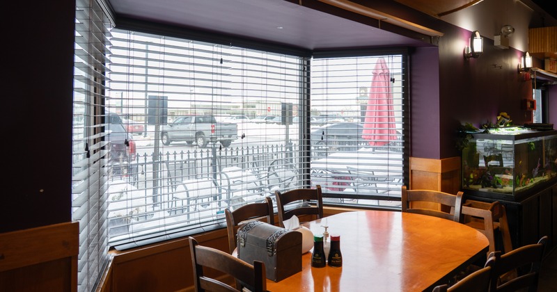 Interior, diner area, table, chairs, corner by street window