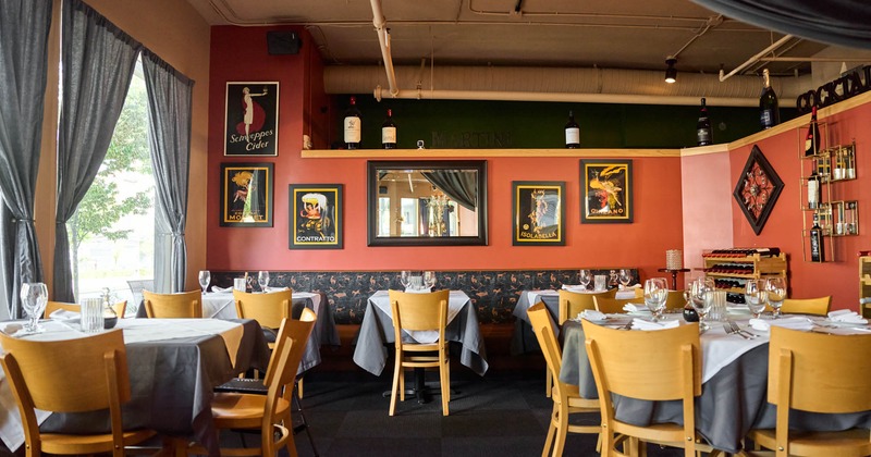Interior, dining tables ready for guests