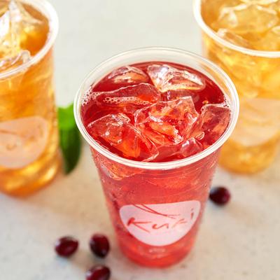 Three iced teas in clear cups.