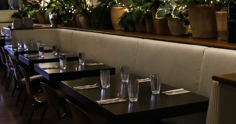 Interior, long seating bench in dining area