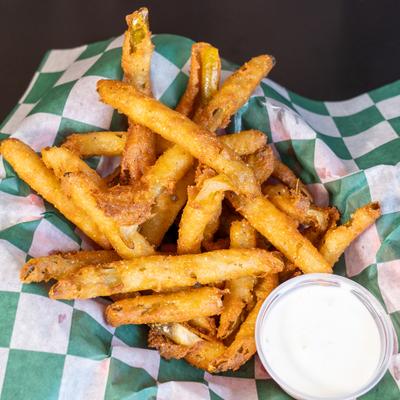 Fries served with a creamy white dipping sauce.