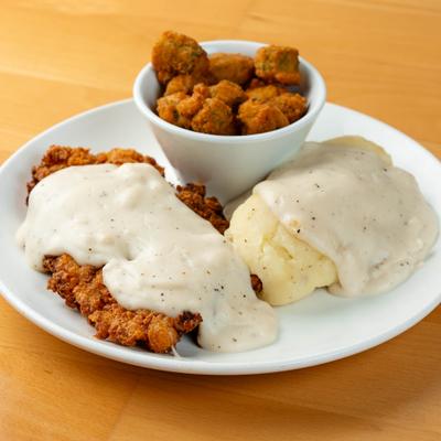 Chicken Fried Steak, with gravy, mashed potatoes, and fried okra.