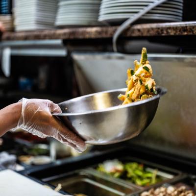 Kitchen action shot, food praparation.