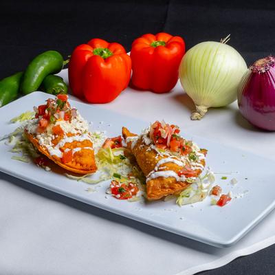Empanadas and fresh vegetables.