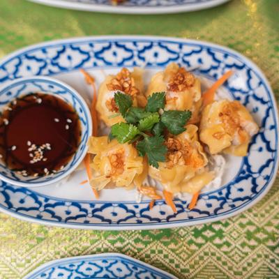 Steamed dumplings with dip.