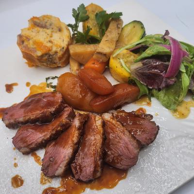 Duck breast and veggies.