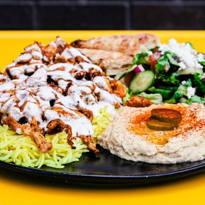 Chicken shawarma plate on the table.