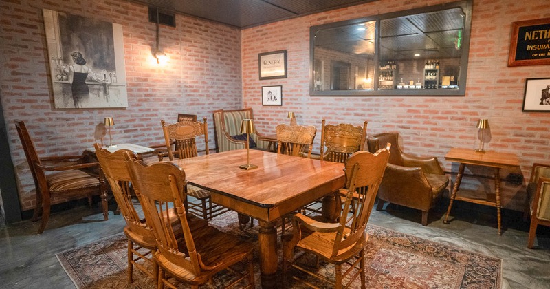 Interior seating area with chairs, tables and armchairs