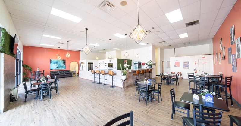 Spacious restaurant interior, seating area and bar