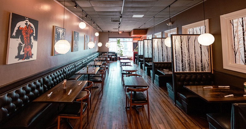 Interior, seating area with tables, chairs, and booths