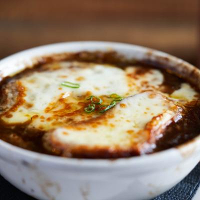 Bowl of French Onion Soup, close-up.