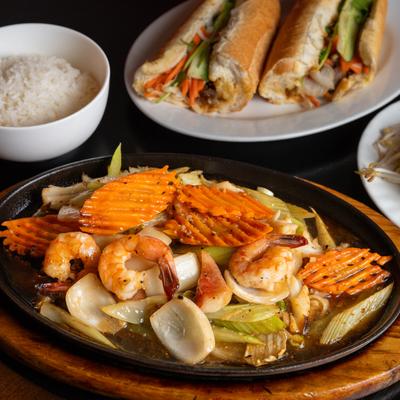 Stir fried seafood with veggies and noodles.