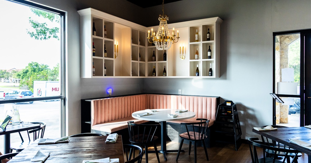 Interior dining area, dining booth set for four guests