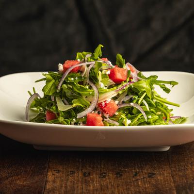 Salad with watermelon, feta, and arugula.