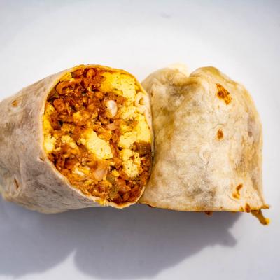 Burrito with bacon, eggs, hashbrowns, cheese, and salsa.