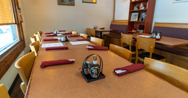 Interior, tables with  chairs and tableware