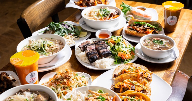 Various meals on a full table