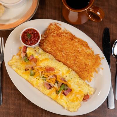 Western omelet, hash browns, and salsa.