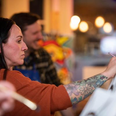 Customer painting a picture.