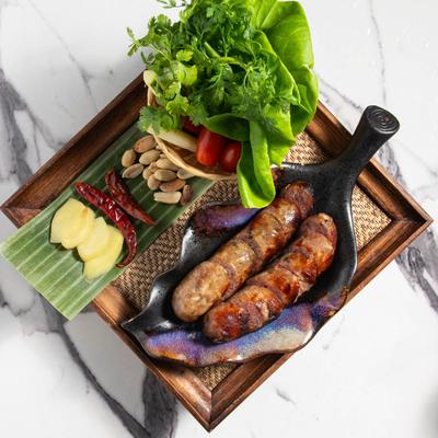 Grilled sausage and salad.