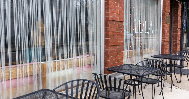 Exterior, patio with tables and chairs