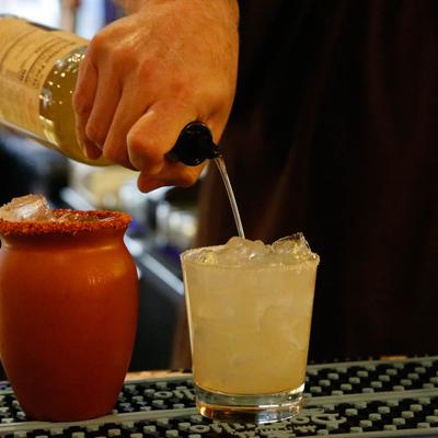 Bartender preparing cocktails.