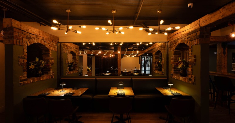 Interior, banquette seating, tables and chairs ready for guests