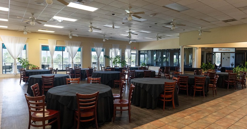 Interior, spacious dining area with tables and chairs