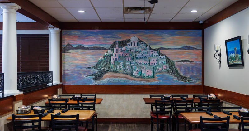 Interior, chairs and tabls, big mural on the wall