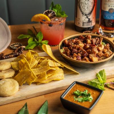 Ceviche de Chicharron served alongside crisp plantain chips.