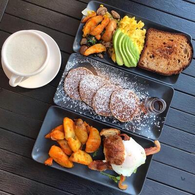 Three different types of food , cup of coffee on the side