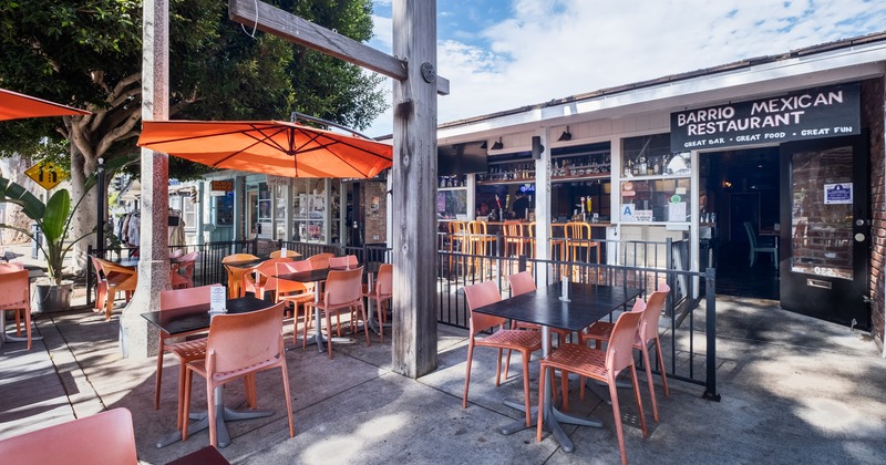 Outdoor seating area in front of the restaurant entrance