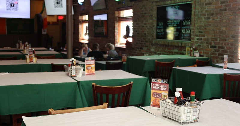 Restaurant interior, dining area with tables ready for guests