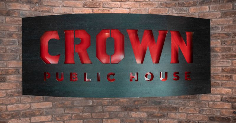 Crown Public House logo on the wall