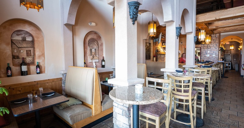 Interior, set tables waiting to receive guests