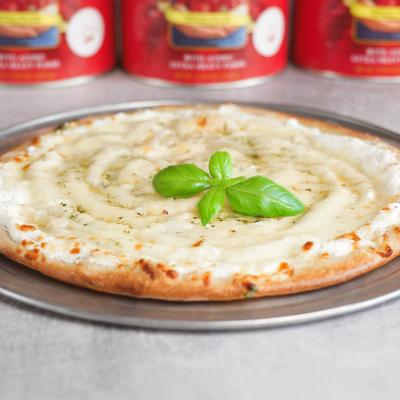 White Pizza topped with five cheese blend and fresh basil.