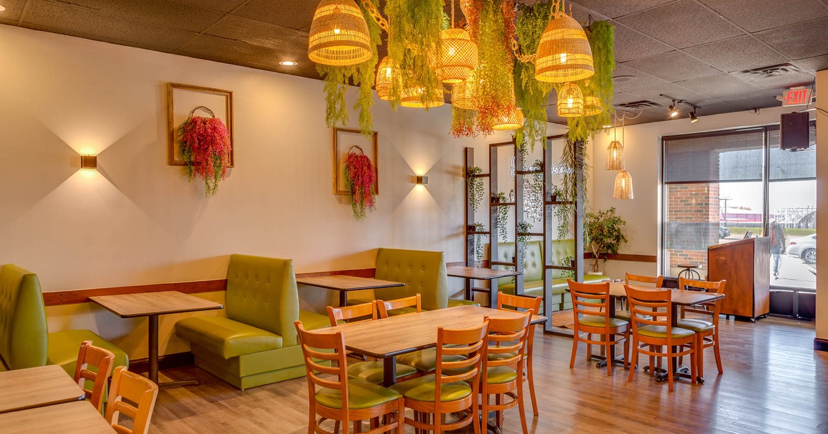 Interior, dining area with large window in the back